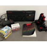 Sinclair Spectrum with games, joy stick and book