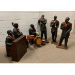 A selection of six jazz player figures