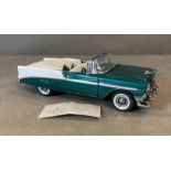 A Franklin Mint Diecast model of a 1956 Chevrolet Bel Air