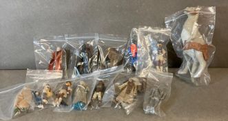 A quantity of Star Wars figures to include Luke Skywalker Return of the Jedi and Darth Vader