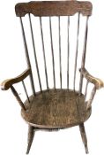 An Elm Windsor rocking chair