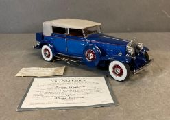 A Franklin Mint Diecast model of The 1932 Cadillac