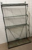 A four tier wrought iron bakers rack, possibly French (H210cm W121cm D47cm)