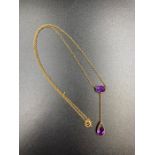 A 9ct gold amethyst style pendant and chain. (Approximate Total Weight 3.2g)