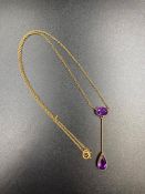 A 9ct gold amethyst style pendant and chain. (Approximate Total Weight 3.2g)