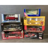 A selection of boxed toy cars and a helicopter and Concorde