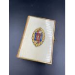 Church Services published by Courtier London with enamel front piece and gilded pages with
