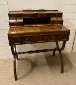 A mahogany ladies writing desk with walnut inlay and red leather writing surface AF