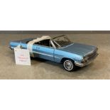 A Franklin Mint Diecast model of a 1963 Chevrolet Impala