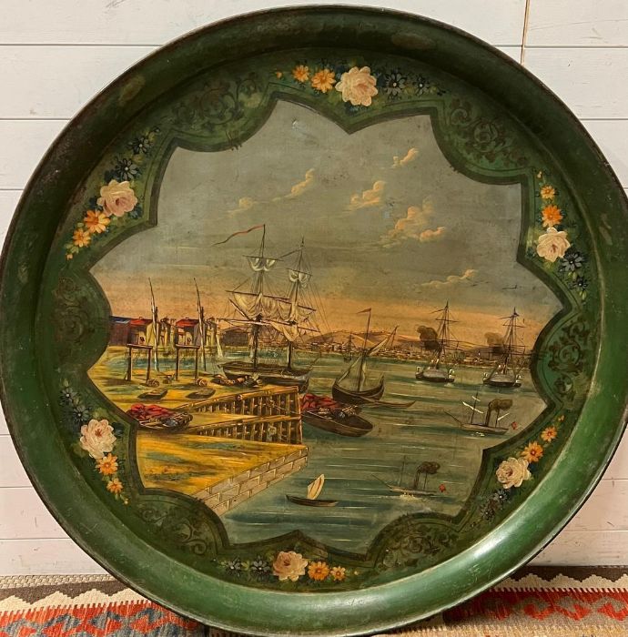 A large metal hand painted tray or wall hanging with port scene (Dia120cm)