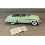 A Franklin Mint Diecast model of a 1950 Chevrolet Skyline Deluxe