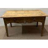 A reclaimed pine side table with two drawers (H68cm W122cm D61cm)