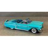 A Franklin Mint Diecast model of a 1958 Chevrolet Impala