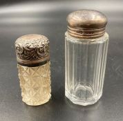 Two silver topped items, glass jar and a scent bottle