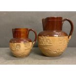 Two Lambeth Doulton stoneware pitchers