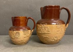 Two Lambeth Doulton stoneware pitchers