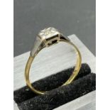 A platinum and diamond ring on an 18ct gold setting (Approximate Total Weight 2.4g) Size Q