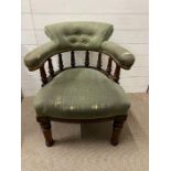 An 19th Century spindle back tub chair