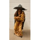 A figure of a witch (H95cm)