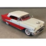 A Diecast model of a 1955 Oldsmobile Super Eight Convertible, boxed