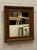 A painted wooden framed hall mirror (51cm x 46cm)