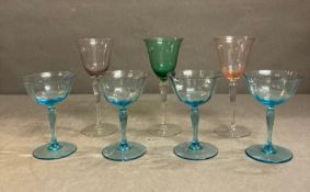 A selection of seven coloured wine and champagne glasses