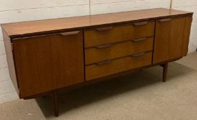 A Mid Century teak sideboard, two cupboard and three drawers (H77cm W184cm D47cm)