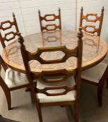 A carved circular table with six chairs (Dia150cm)