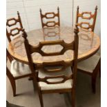 A carved circular table with six chairs (Dia150cm)