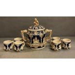 An antique German punch bowl and six cups in blue and white from the palatinate region