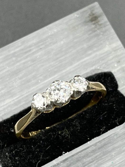 An 18ct yellow gold set three stone diamond ring. (Approximate weight 2.5g) Size P - Image 2 of 2