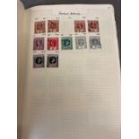 A Worldwide colonial stamp album from Kenya to Rhodesia