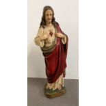 A plaster figure of Jesus sacred heart