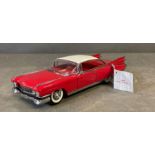 A Franklin Mint Diecast model of a 1959 Cadillac Seville, boxed