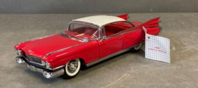 A Franklin Mint Diecast model of a 1959 Cadillac Seville, boxed