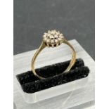 A 9ct gold and diamond ring (Approximate total weight 1.6g) Size N