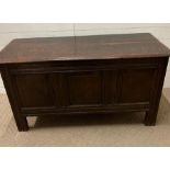 Three panelled oak coffer with hinged lid (H70cm W135cm D54cm)