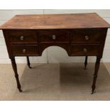Regency style mahogany side table, arrangement of four drawers, turned legs, brass caps and
