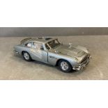 A Franklin Mint Diecast model of The James Bond Aston Martin DB5, boxed