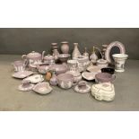 A large volume of Wedgwood Jasperware items, various shapes, styles and colours