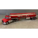 A Franklin Mint Diecast model of a Mack Tractor and Hose Co Trailer