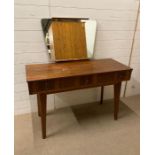 A three drawer Mid Century dressing table with mirror