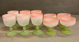 A selection of ten frosted pink and green glasses, wine and champagne