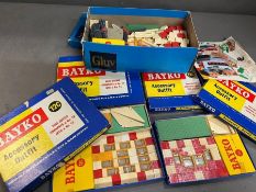 A selection of 1960's Meccano Bayko kits