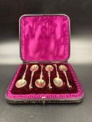 A cased set of six silver Victorian teaspoons, hallmarked for London 1889 by Charles Stuart Harris