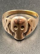 A gold Gents ring with skull them (Approximate weight 6g) untested gold Size X