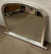 An arched over mantle mirror (120cm x 95cm)