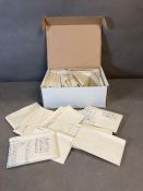 A box of stamps in packets, British Colonies mint