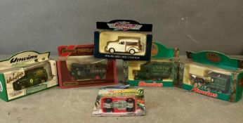 A selection of six boxed model vehicles t include Unwin's Delivery van, a Guinness delivery truck
