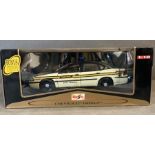 A Maisto Diecast model of a Chevrolet Impala Cop Car